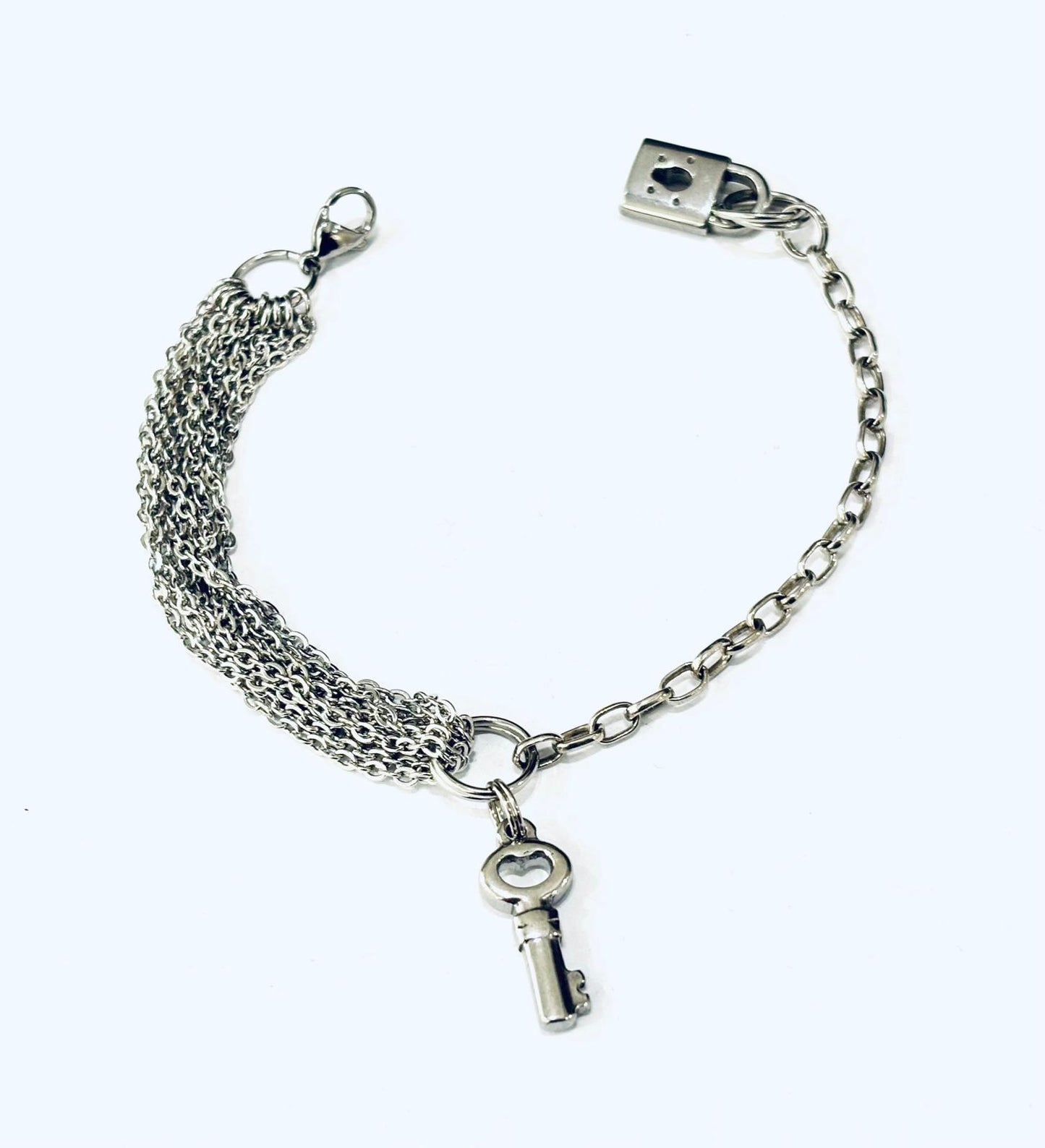 BRACCIALE IN ACCIAIO MULTICHAIN CON CIONDOLI CHIAVE E LUCCHETTO