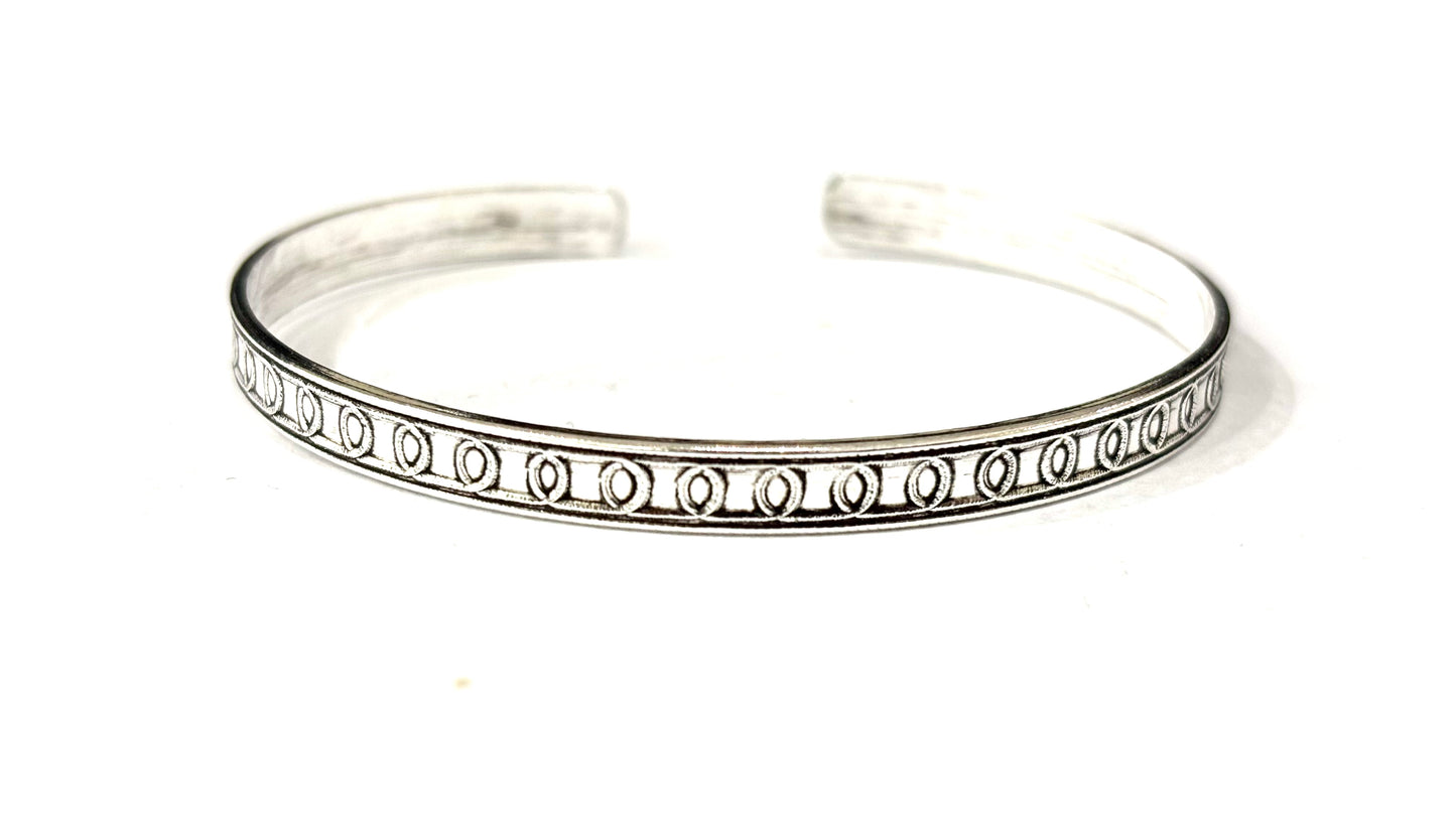 BRACCIALE RIGIDO PIATTO LAVORATO - ARGENTO 925